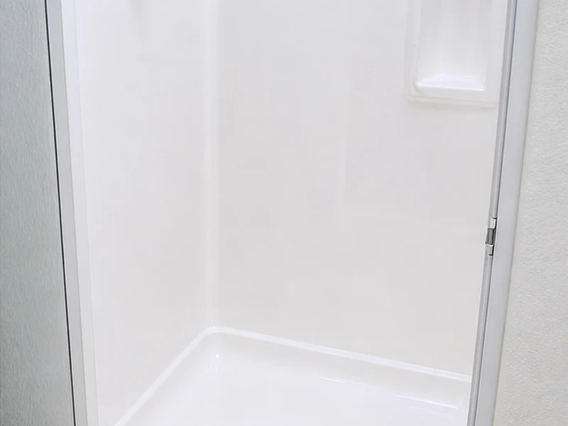 Fiberglass shower stall in a Lawrence Station condo after refinishing, bright glossy white finish, Santa Clara